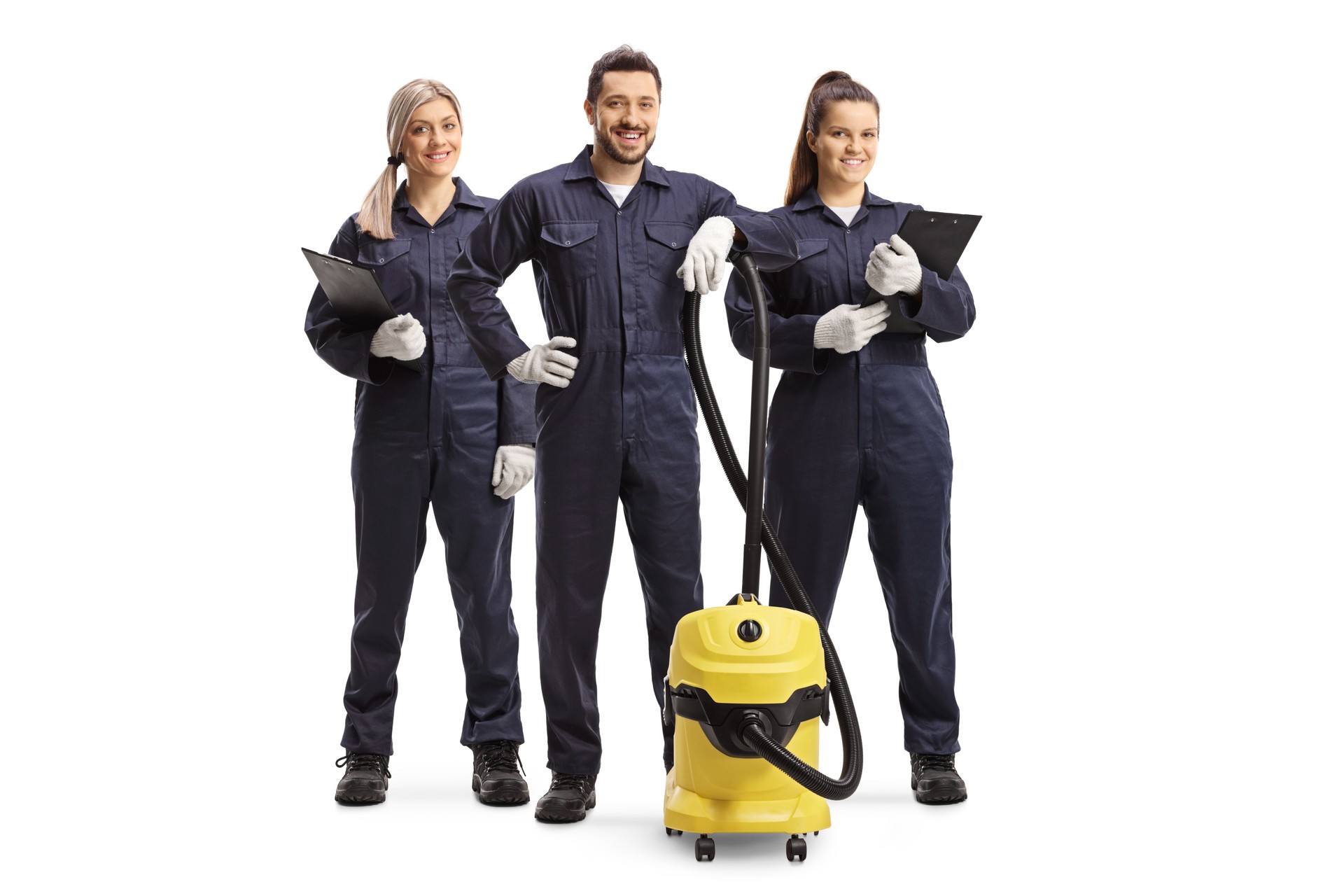 Team of cleaning workers with a vacuum cleaner